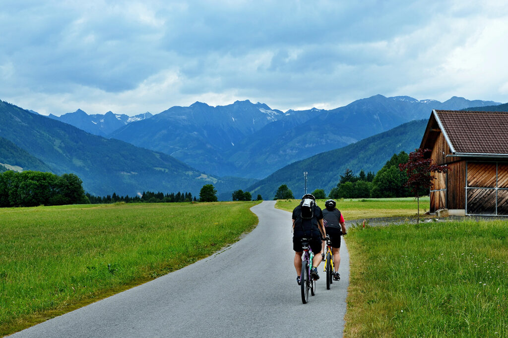 Austrian Alps – cyclists on the cycle path not far Lind im Draut